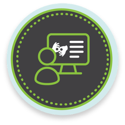 ícono verde de una persona sentada frente a una computadora mirando información